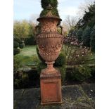 Finials: A Swedish style composition stone finial on pedestal, 2nd half 20th century, 218cm high