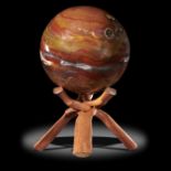 Interior Design/Minerals: A fossilised wood sphere, Madagascar, on wooden stand, 21cm diameter