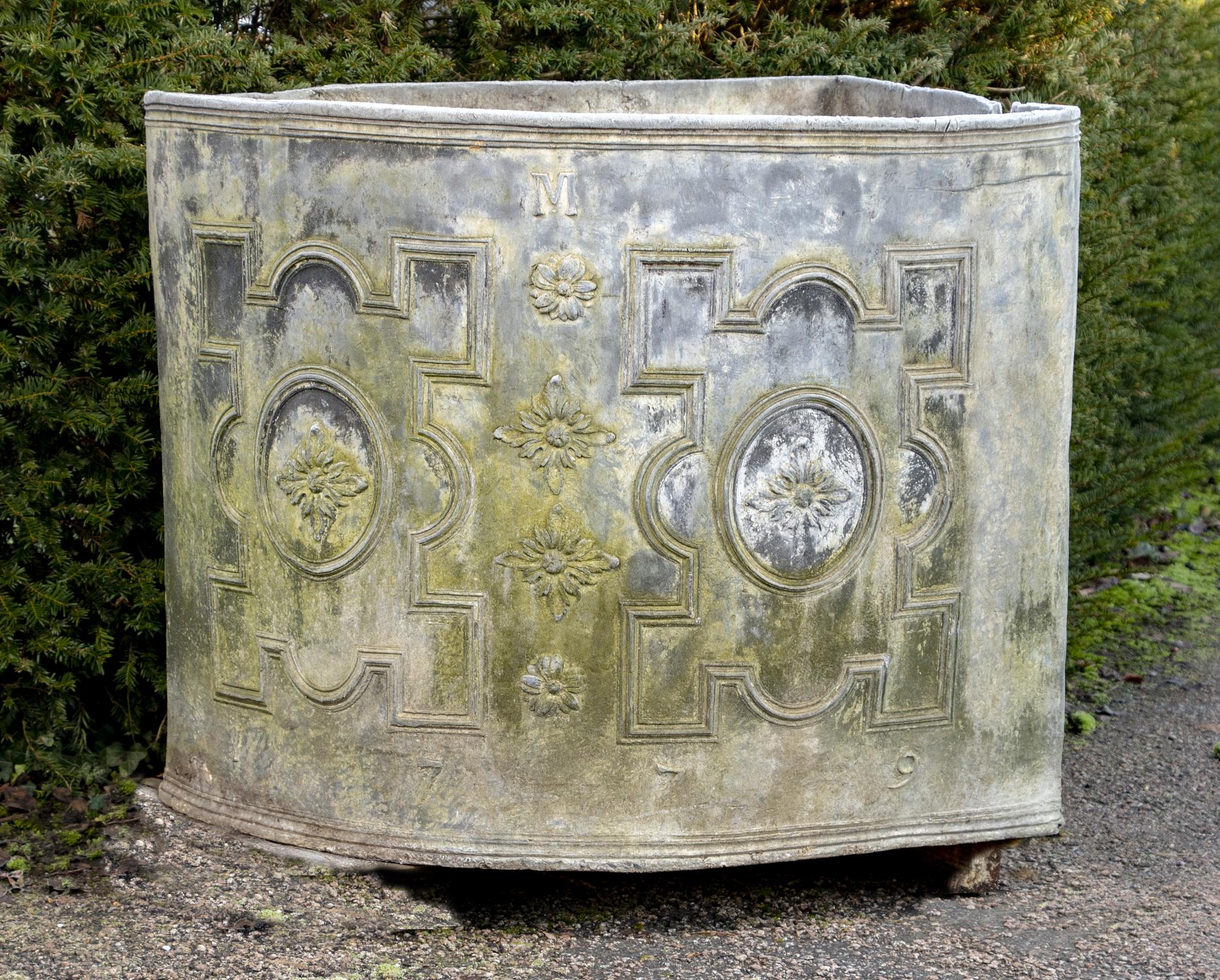 Cistern: A rare Georgian lead corner cistern, with initial M and dated 1779, 92cm high by 120cm