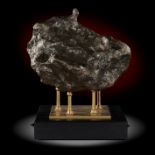 Meteorites: A Campo del Cielo meteorite, on metal stand , the specimen 30cm high, 36kg. From an
