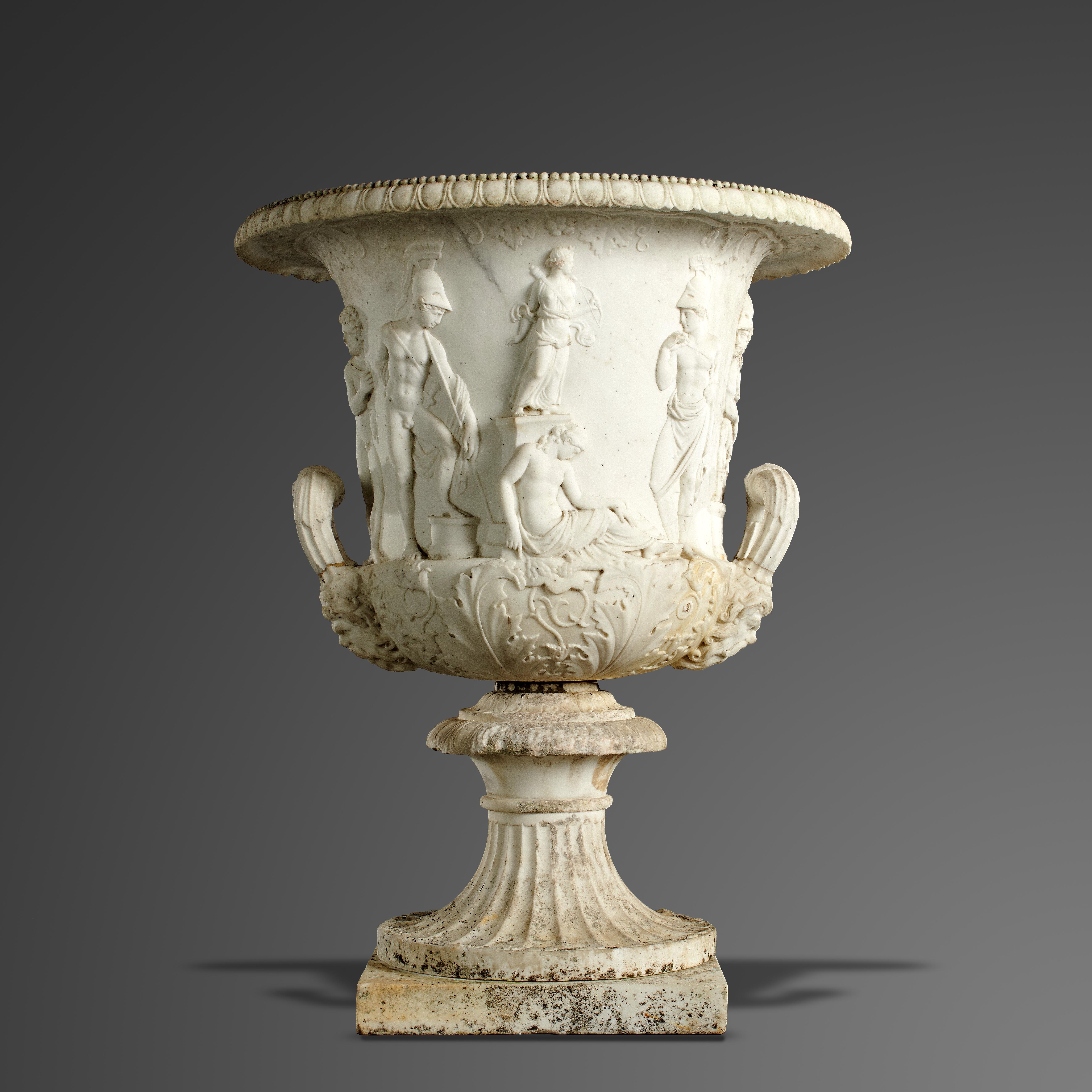 Garden urns/pots/planters: A carved white marble Medici urn, late 18th/early 19th century, 101cm