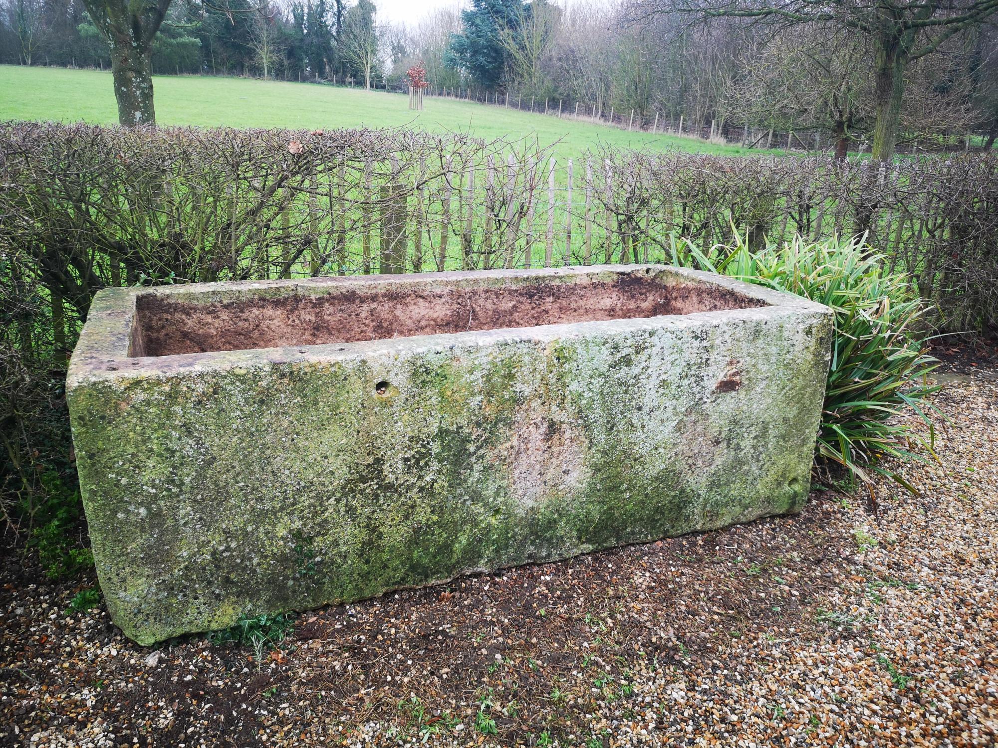 Trough/planter: A large carved limestone trough, 68cm high by 203cm long by 84cm deep