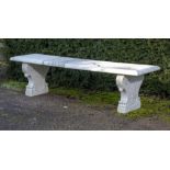 Garden seats: A carved white marble bench, Italian, circa 1900, with later veined marble top,