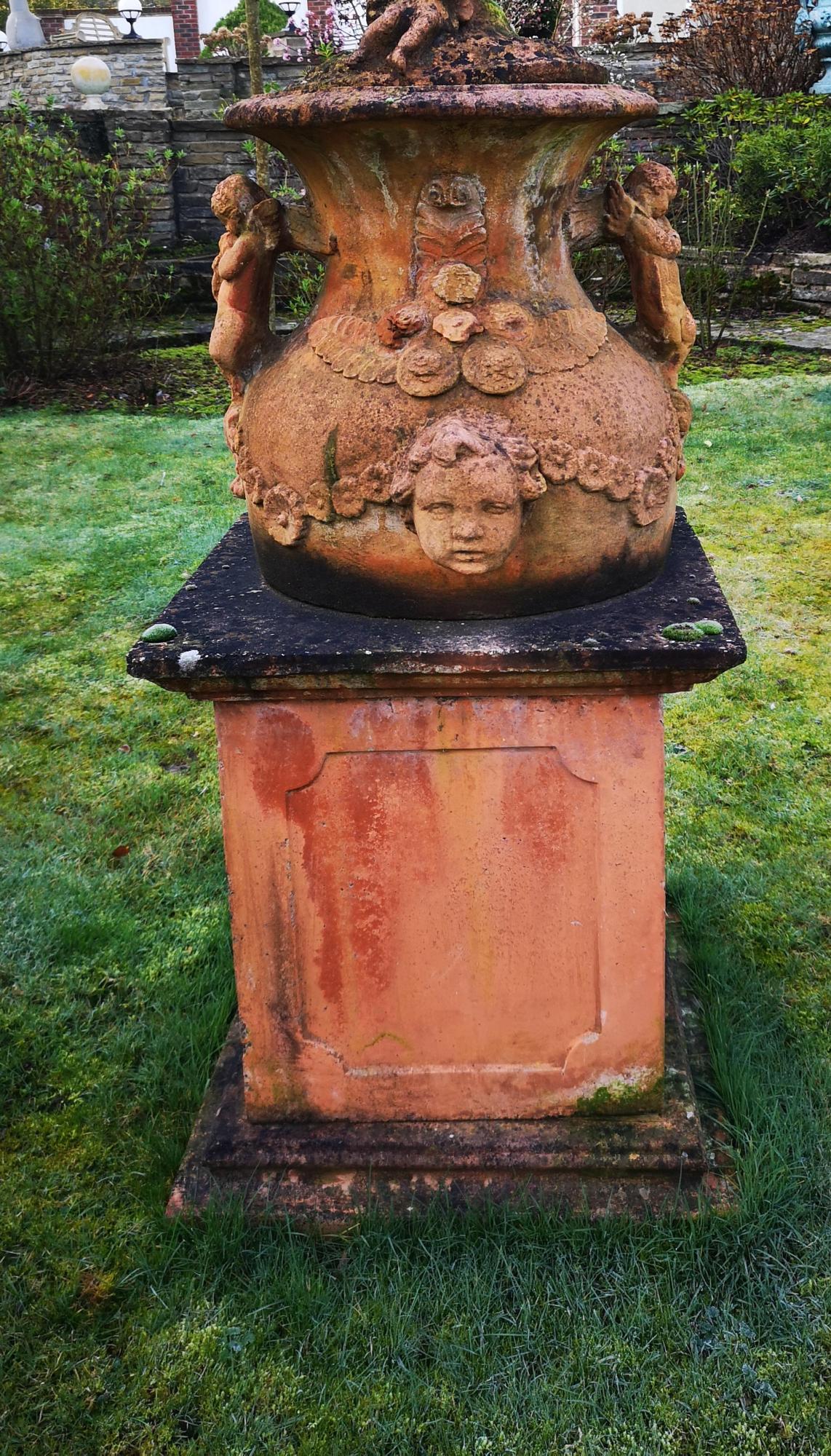 Finials: A pair of composition stone lidded finial tops on pedestals, 2nd half 20th century, 165cm