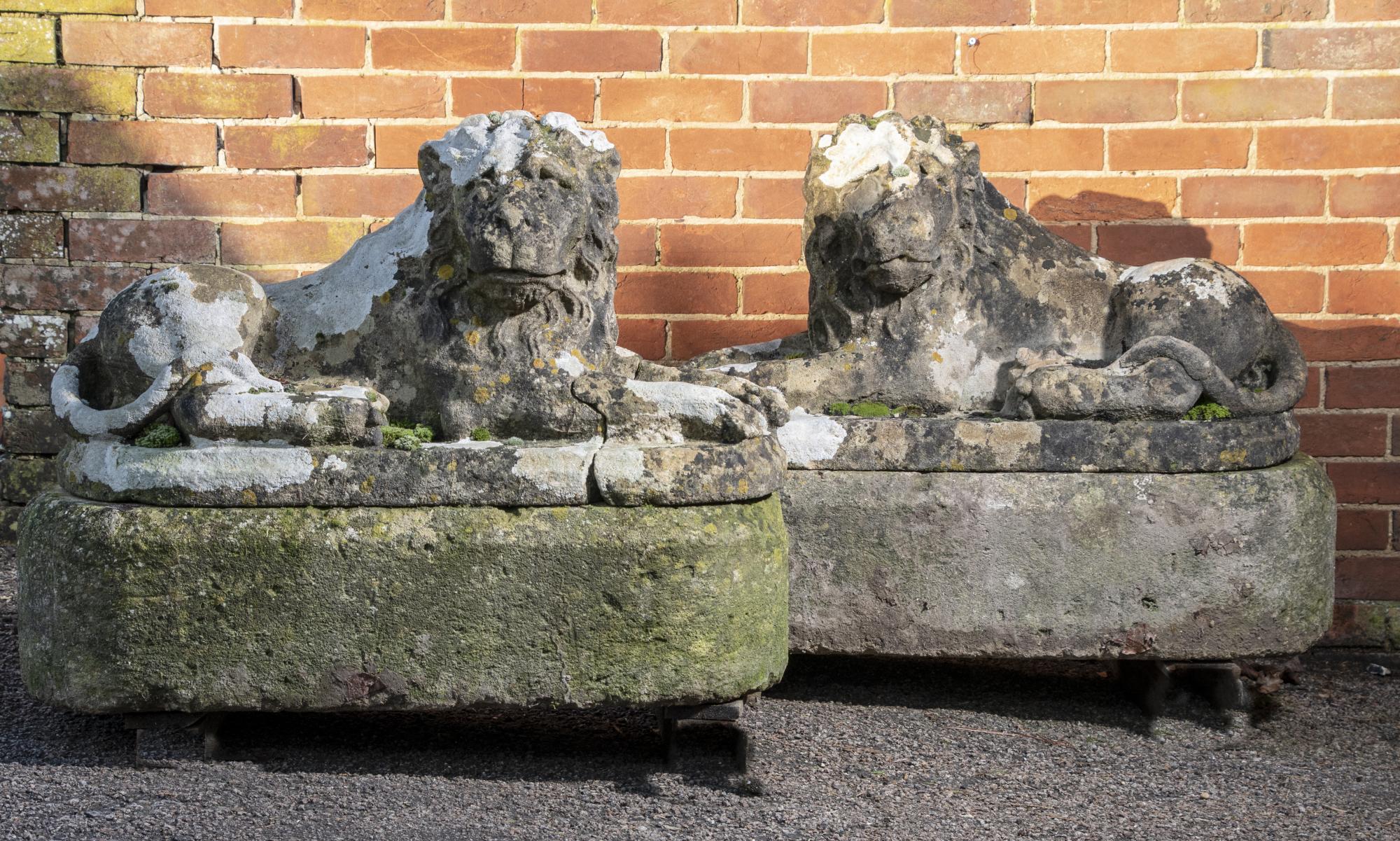 Garden statues: A pair of Georgian carved sandstone reclining lions, 2nd half 18th