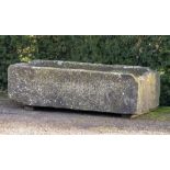 Trough/planter: A carved sandstone trough, 39cm high by 138cm long by 71cm deep