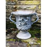 Garden urns/pots/planters: A pair of lead urns, modern, 45cm high, together with a William and Mary