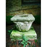 Wells: An unusual Venetian 17th century style carved limestone wellhead, 19th century on base,