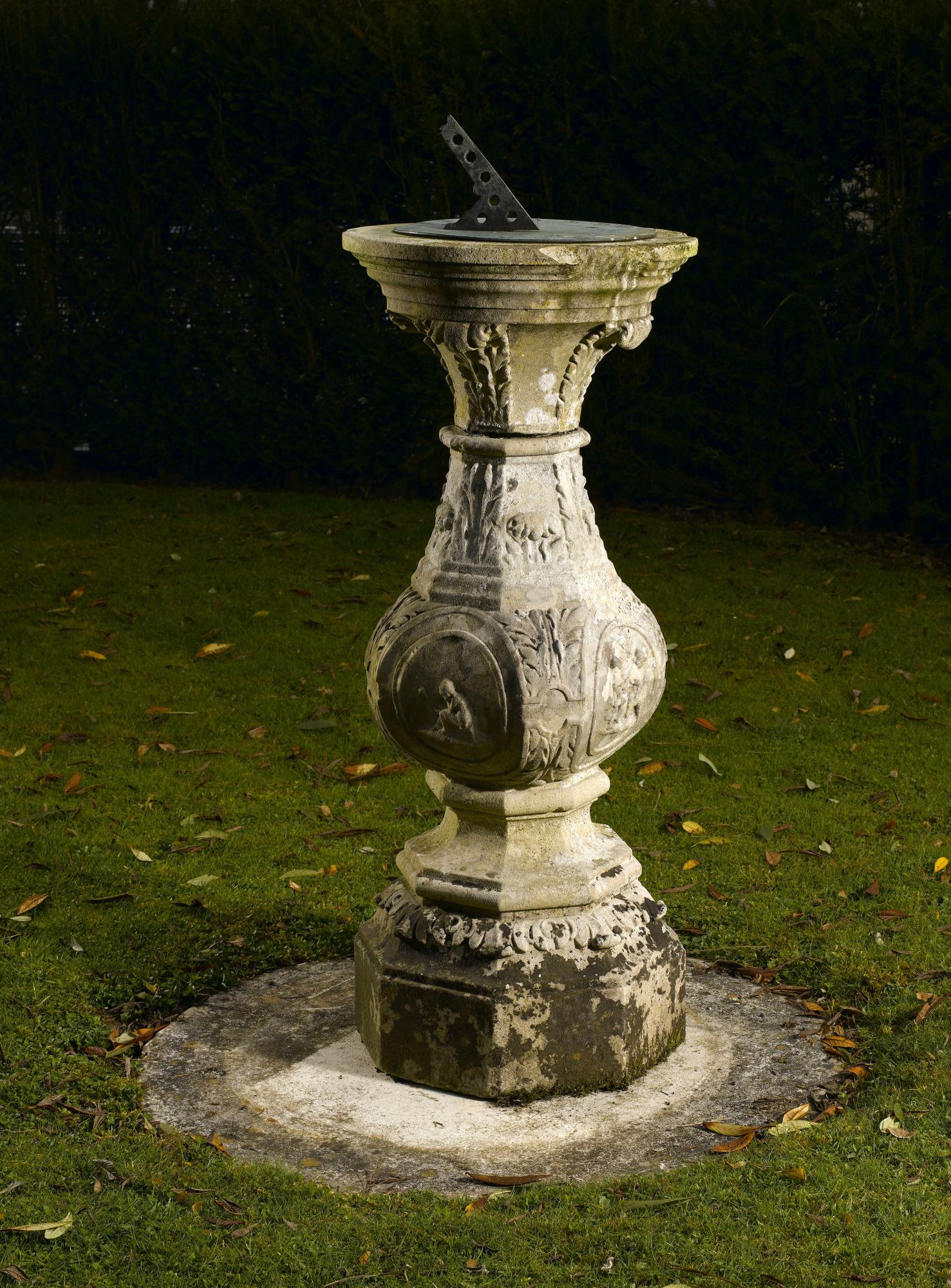 Sundials: An unusual Georgian style carved Portland stone sundial, early 20th century, with