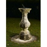 Sundials: An unusual Georgian style carved Portland stone sundial, early 20th century, with