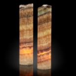 Lights: A pair of polished cylindrical onyx lamps, Mexico, 48cm high