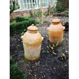 Gardening: A pair of terracotta forcers with lids, dated 2001, 65cm high, together with two glazed