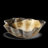 Mineral bowls/interior design: A banded onyx bowl, Mexico, 58cm by 52cm