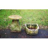 Trough/planter: A D-shaped carved limestone trough, 25cm high by 60cm wide, together with a carved