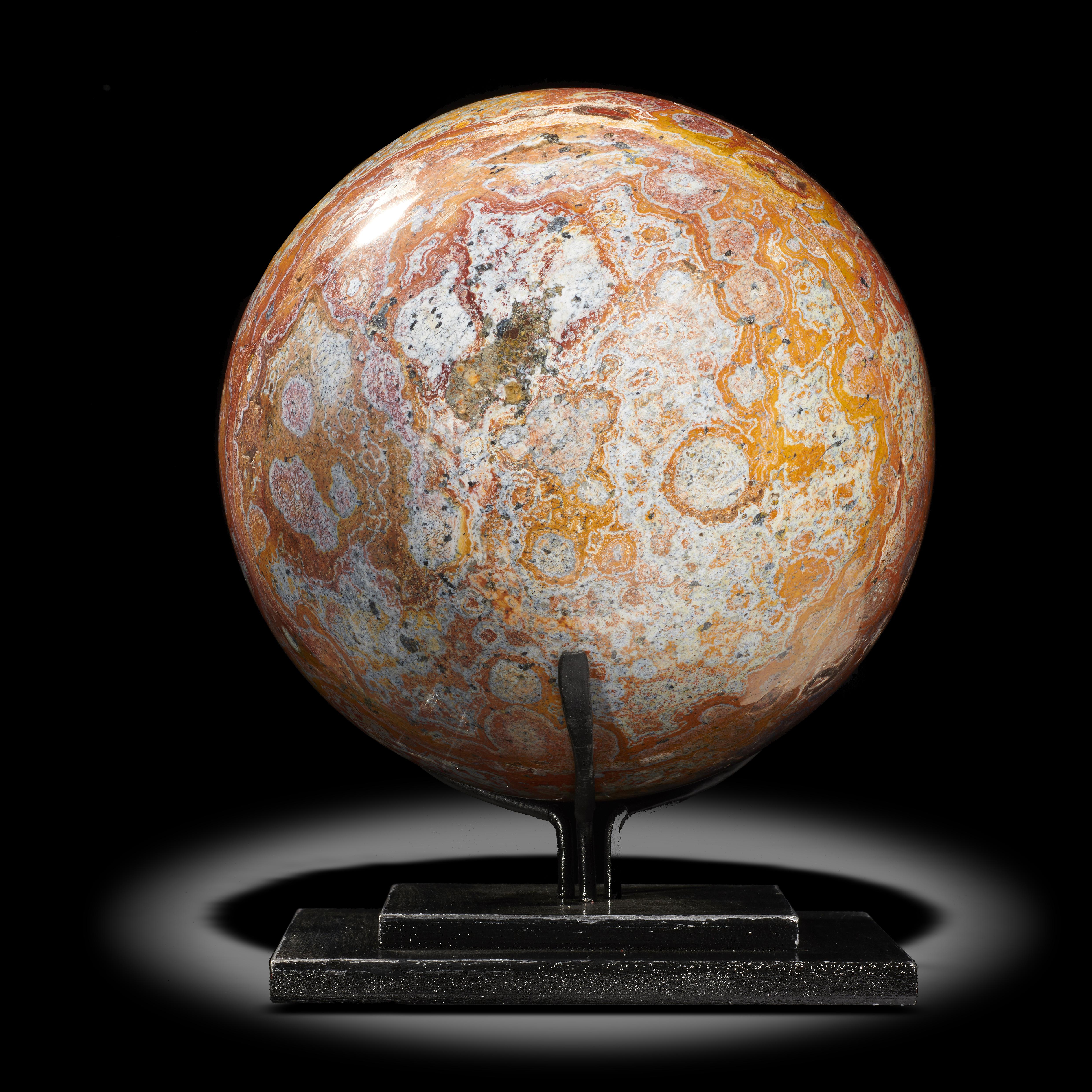 Interior design/minerals: A jasper sphere on metal stand, Madagascar, 17cm diameter