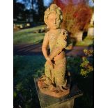 Water features: A terracotta fountain figure of a mer-child, Italian, early 20th century, drilled