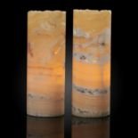 Lights: A pair of polished cylindrical onyx lamps, Mexico, 30cm high