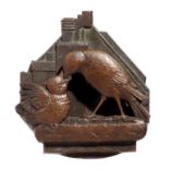Door furniture: An unusual small bronze door knocker in the form of a bird feeding its young,