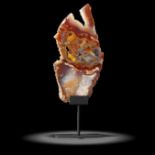 Interior design/minerals: An unusual chalcedony and agate slice, Brazil, on metal stand, overall