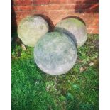 Finials: Three composition stone gate pier balls, 38cm diameter