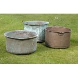Garden pots/planters: Three washing coppers, 19th century, including two with handles, the largest