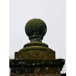 Finials: A pair of carved stone gate pier balls, 19th century, 56cm high