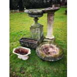 Garden pots/planters: A pair of tazza shape composition stone urns, one on pedestal, the other