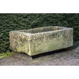 Trough/planter: A carved stone trough, 50cm high by 156cm long by 86cm deep