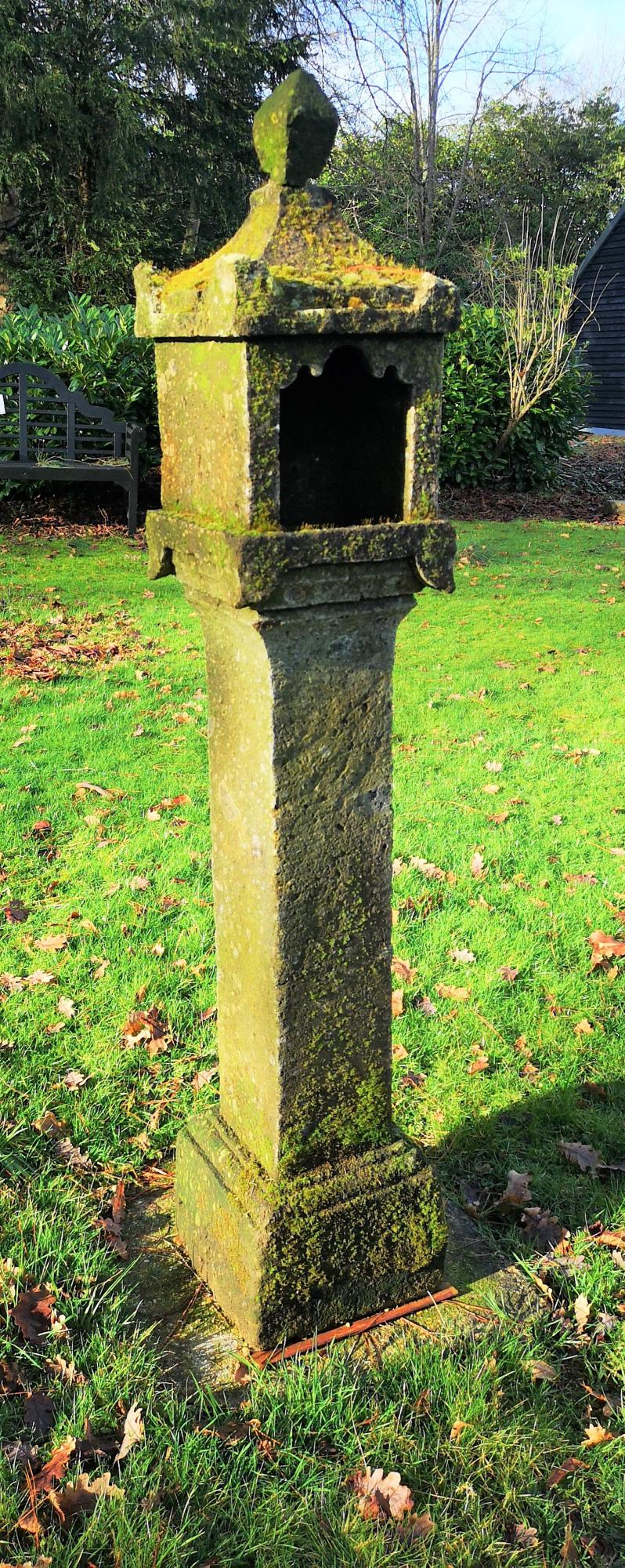 Garden Sculpture: A lava stone lantern, Japanese, 20th century, 160cm high