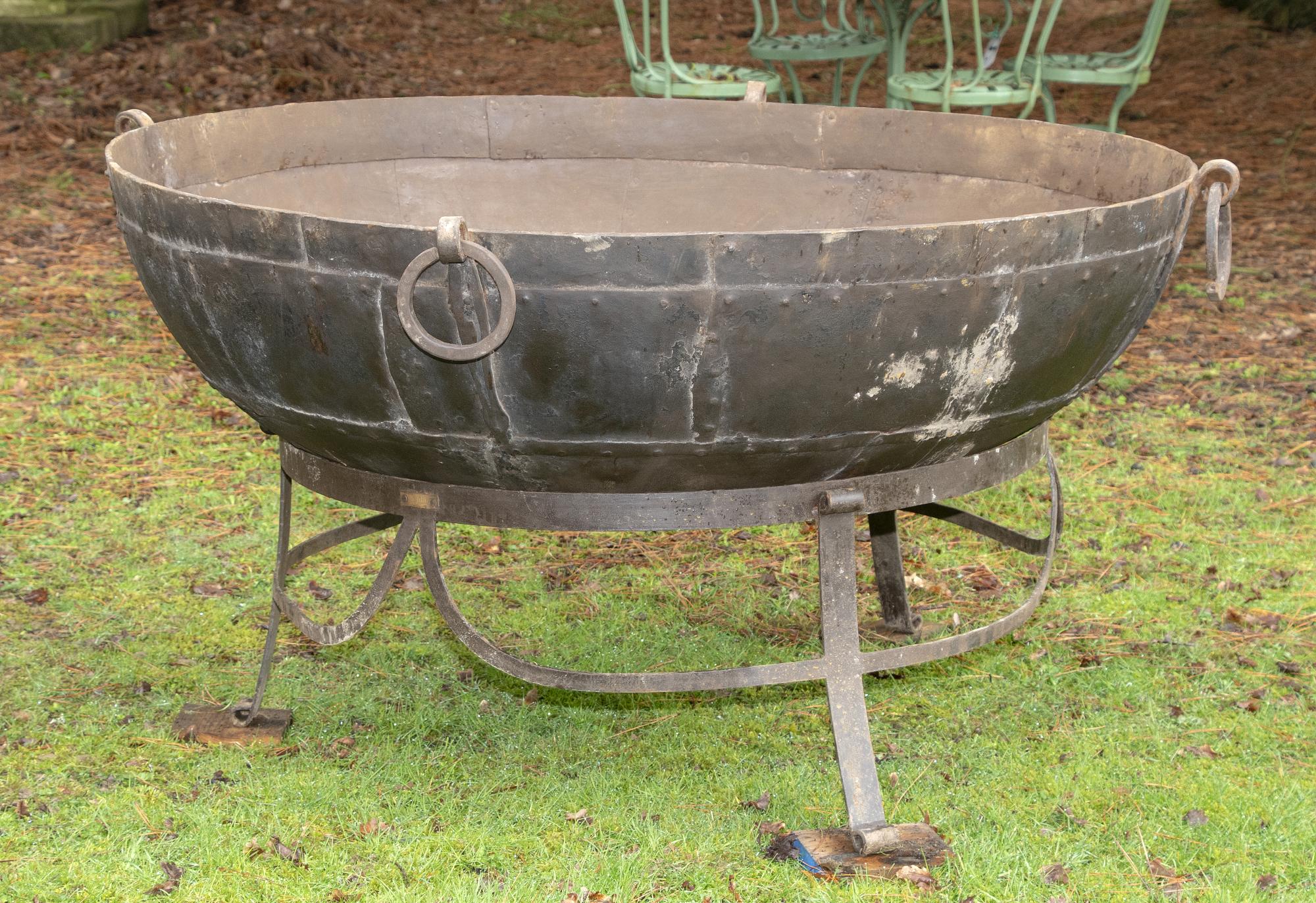 Fire pit bowl: † A large wrought iron Kadai of riveted construction, Indian, modern, on iron