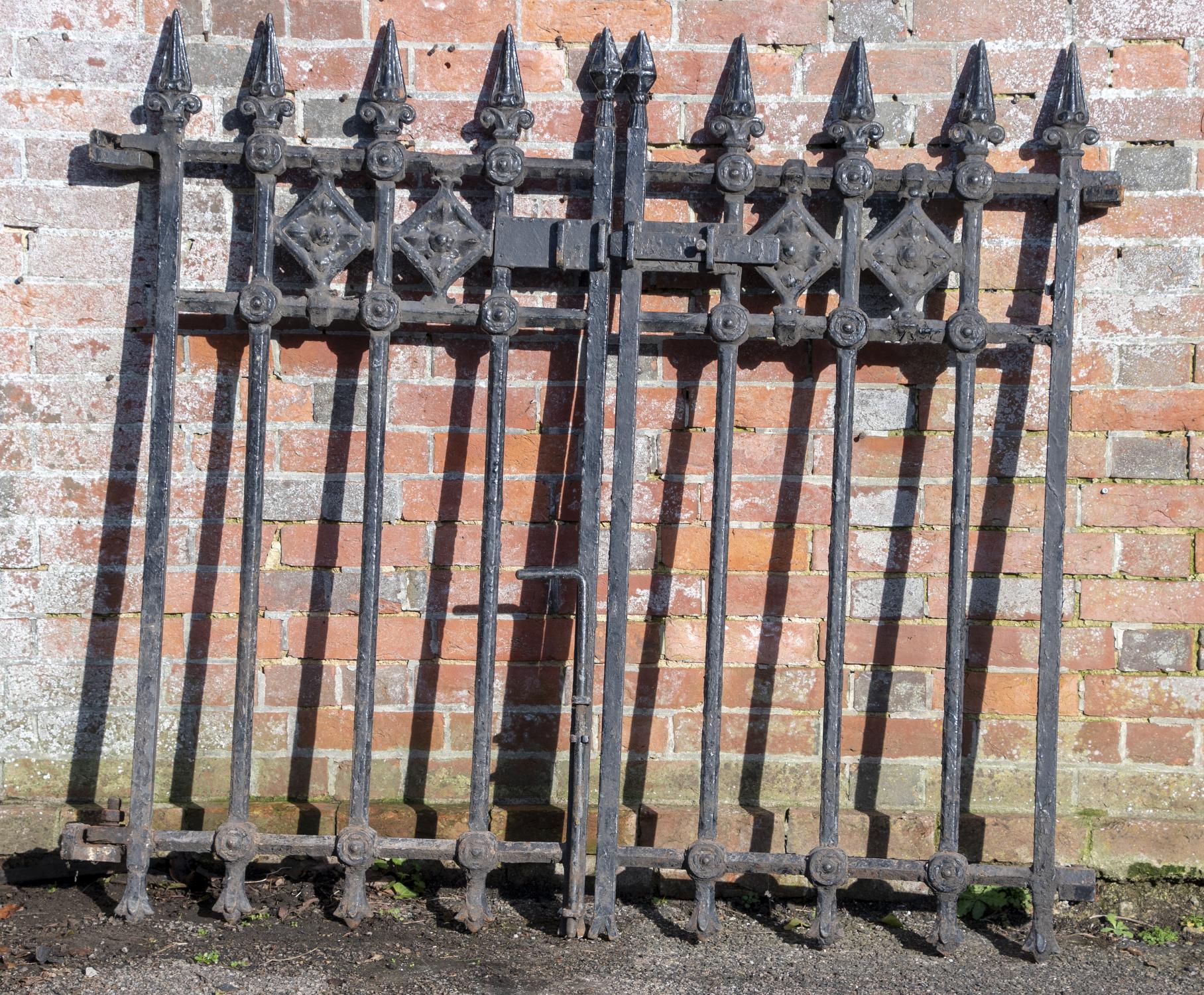 Architectural: A pair of Victorian cast iron gates, circa 1860, 140cm high by 150cm wide