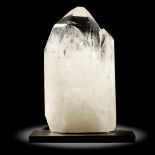 Interior design/minerals: A quartz freeform, Madagascar, on metal stand, 19cm high