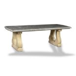 Garden tables: A grey veined marble table, modern, on carved limestone supports, 251cm long by 100cm