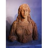 Garden: An unusual terracotta bust of a woman 18th century or earlier 70cm high