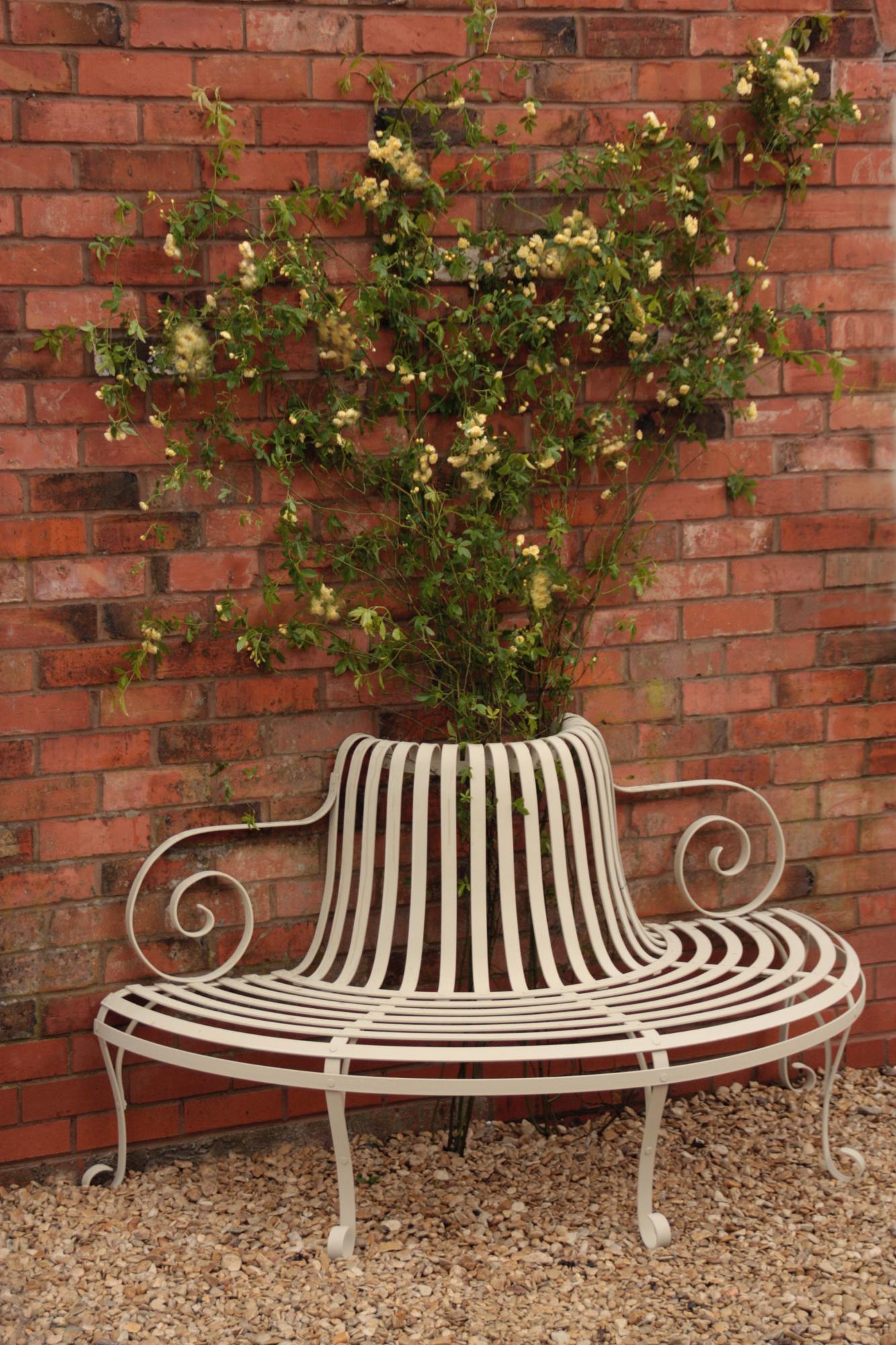 Garden Furniture: A pair of strapwork demi-lune seats modern 175cm wide