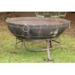 Fire pit bowl:† A large wrought iron Kadai of riveted construction Indian, modern on iron stand