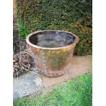 Garden pots/planters:A burnished washing copper 19th century 56cm diameter
