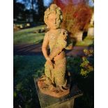 Water Features:A terracotta fountain figure of a mer-child Italian, early 20th century drilled for
