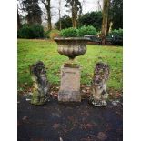 Garden Statuary:A pair of composition stone seated lions 2nd half 20th century 63cm high, together