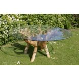 Garden Furniture: A root wood table with glass top 180cm diameter