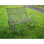 Garden Chair: An unusual wrought iron conversation rocking chair 112cm wide