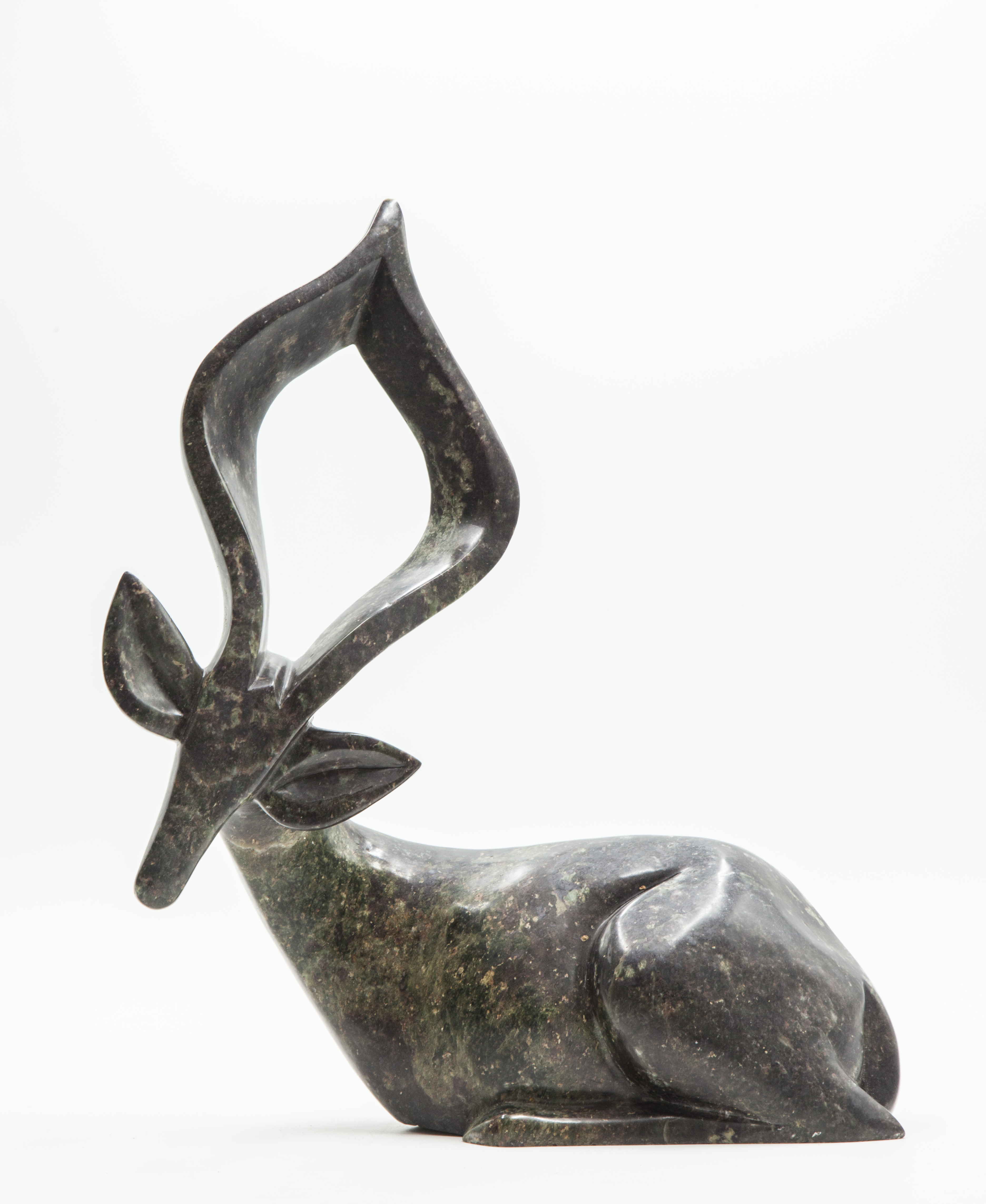 Modern Sculpture: Fungai Dodzo Resting Ducker Cobalt Stone Signed 40cm high by 32cm wide by 11.5cm