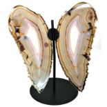 Interior Design/Minerals: A pair of gilt outlined agate wings, Brazil, mounted on iron stand, 34cm