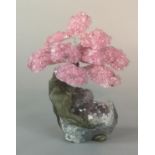 Interior Design/Minerals: A similar 15 branch rose quartz simulated bonsai tree on natural quartz