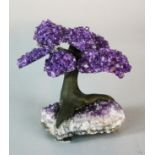 Interior Design/Minerals: A similar smaller amethyst 9 branch simulated bonsai tree on natural
