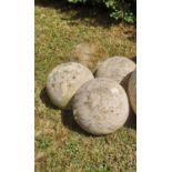Gate piers: A set of four carved Cotswold stone balls, 23cm diameterThe Cotswold Collection. See lot