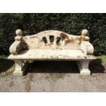 Garden Seats: A near pair of Arts and Craft carved Cotswold stone seats, early 20th century, 176cm