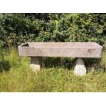 Troughs/Planters: A carved sandstone rectangular trough raised on two staddlestone bases, 88cm