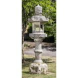 Japanese Lanterns: A granite kasuge lantern, Japanese, Meiji Period 1868-1912, 210cm high