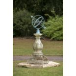 Sundials: A carved Cotswold stone sundial pedestal on octagonal surround with later copper armillary